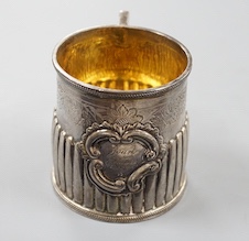 A George IV demi-fluted silver christening mug, with later engraved inscription, London, 1823, 69mm.